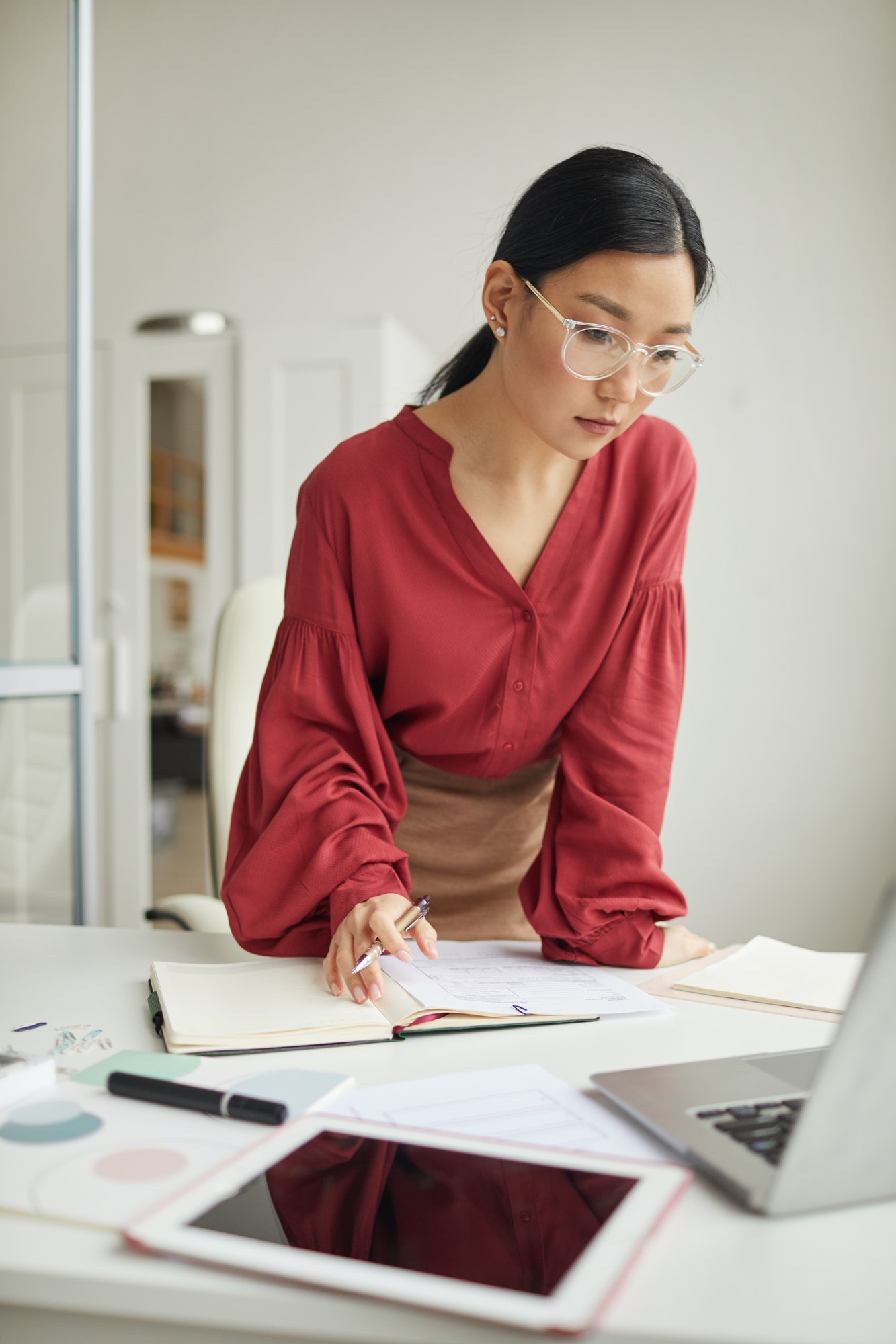 Elegant Asian Businesswoman in Office